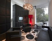 stunning-apartment-interior-design-ideas-with-mesmerizing-black-leather-wall-plaid-ideas-and-modern-black-fabric-2-armchair-also-comfy-sofa-above-cream-rugs-polka-dots-pattern-on-the-floor-as-well-as-830x659.jpg